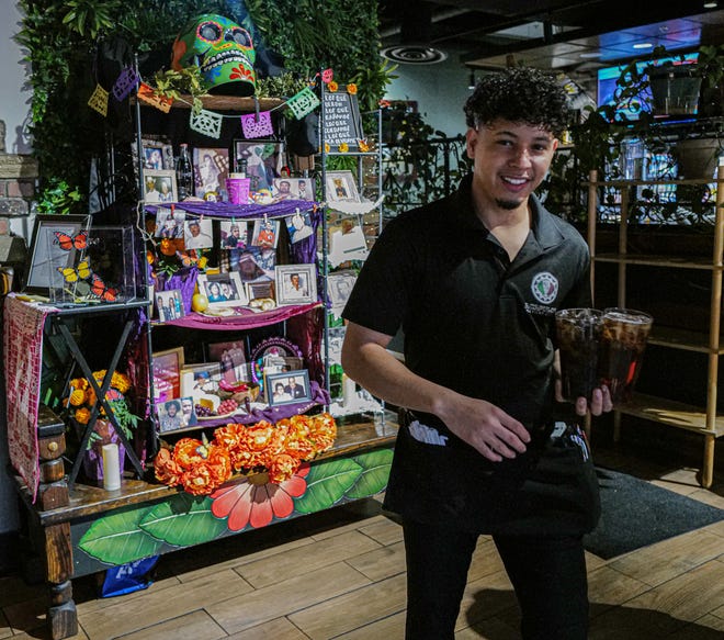 Acapulco Mexican Cusine restaurant in Frandor features an ofrenda celebrating Dia de los Muertos Friday, Nov. 1, 2024.