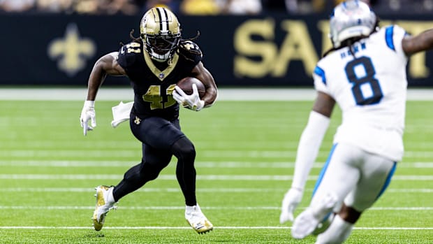 New Orleans Saints running back Alvin Kamara (41) in the open field against Carolina Panthers cornerback Jaycee Horn (8) 