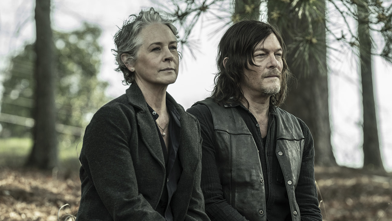 Norman Reedus as Daryl Dixon, Melissa McBride as Carol Peletier in The Walking Dead