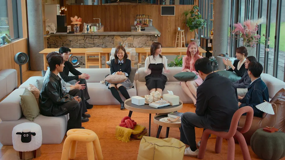 The cast of 'Better Late Than Single' sits around a lounge.