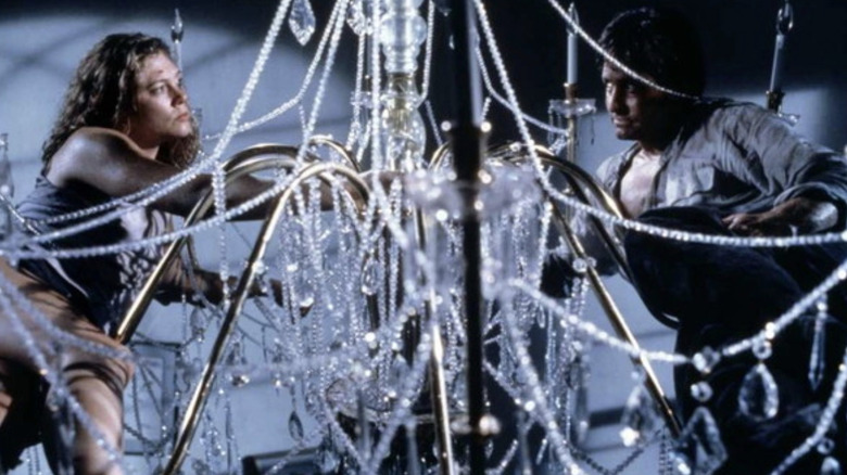 Barbara (Kathleen Turner) and Oliver (Michael Douglas) fight in a chandelier in The War of the Roses