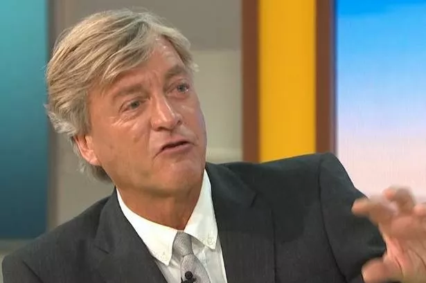 Richard Madeley gestures on TV