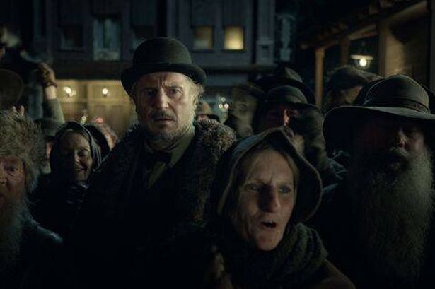 Liam Neeson as 'Impresario' in The Ballad of Buster Scruggs