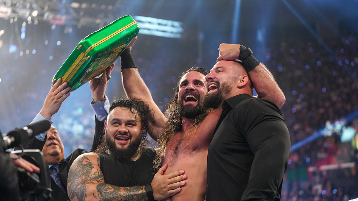 Seth Rollins celebrates