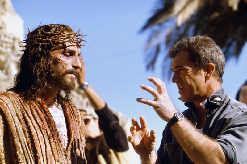 The Passion of the Christ: director Mel Gibson speaks to Jim Caviezel on the set of his 2004 film. Photograph: Philippe Antonello/Icon Distribution