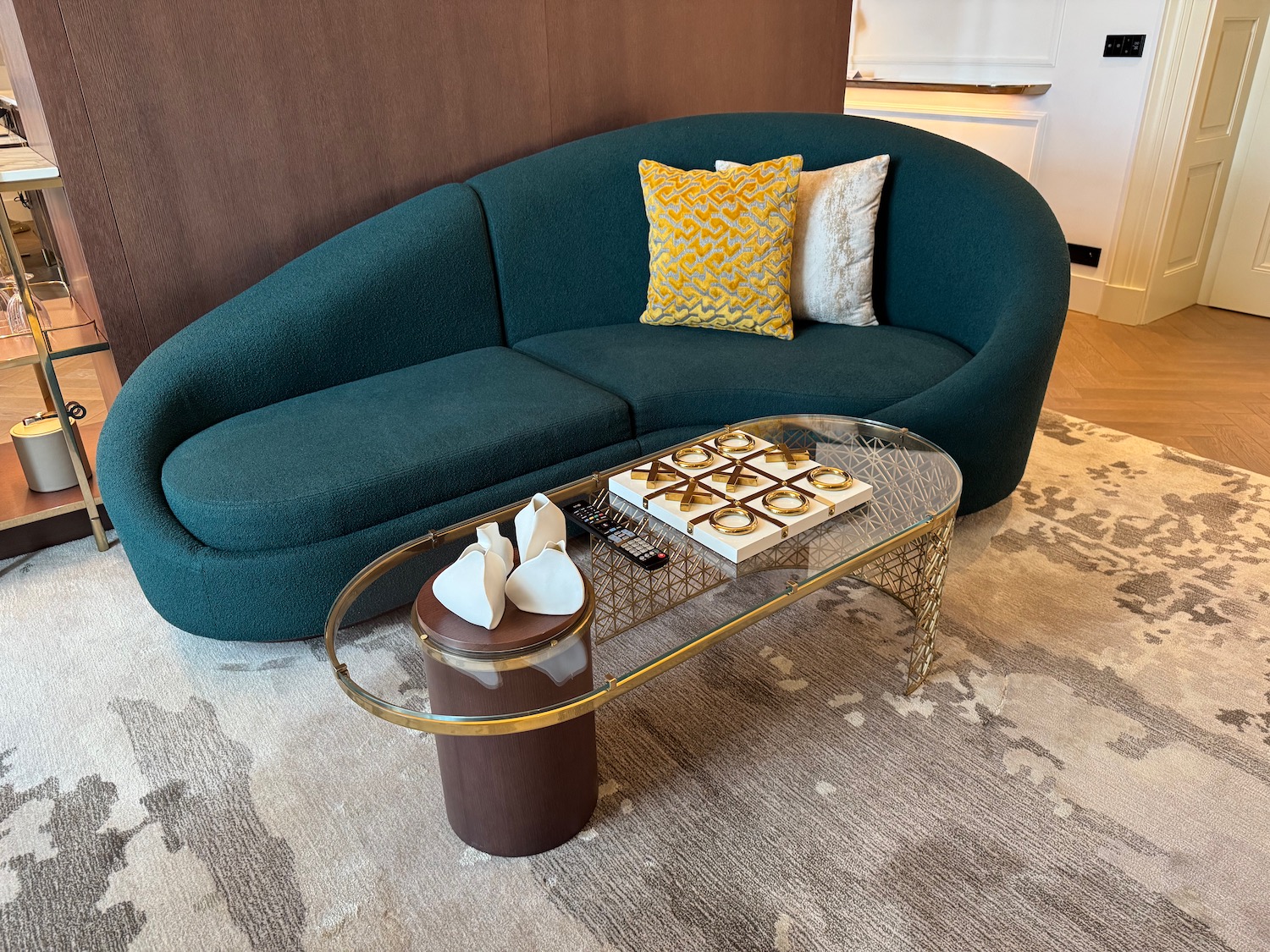 a couch with pillows and a coffee table