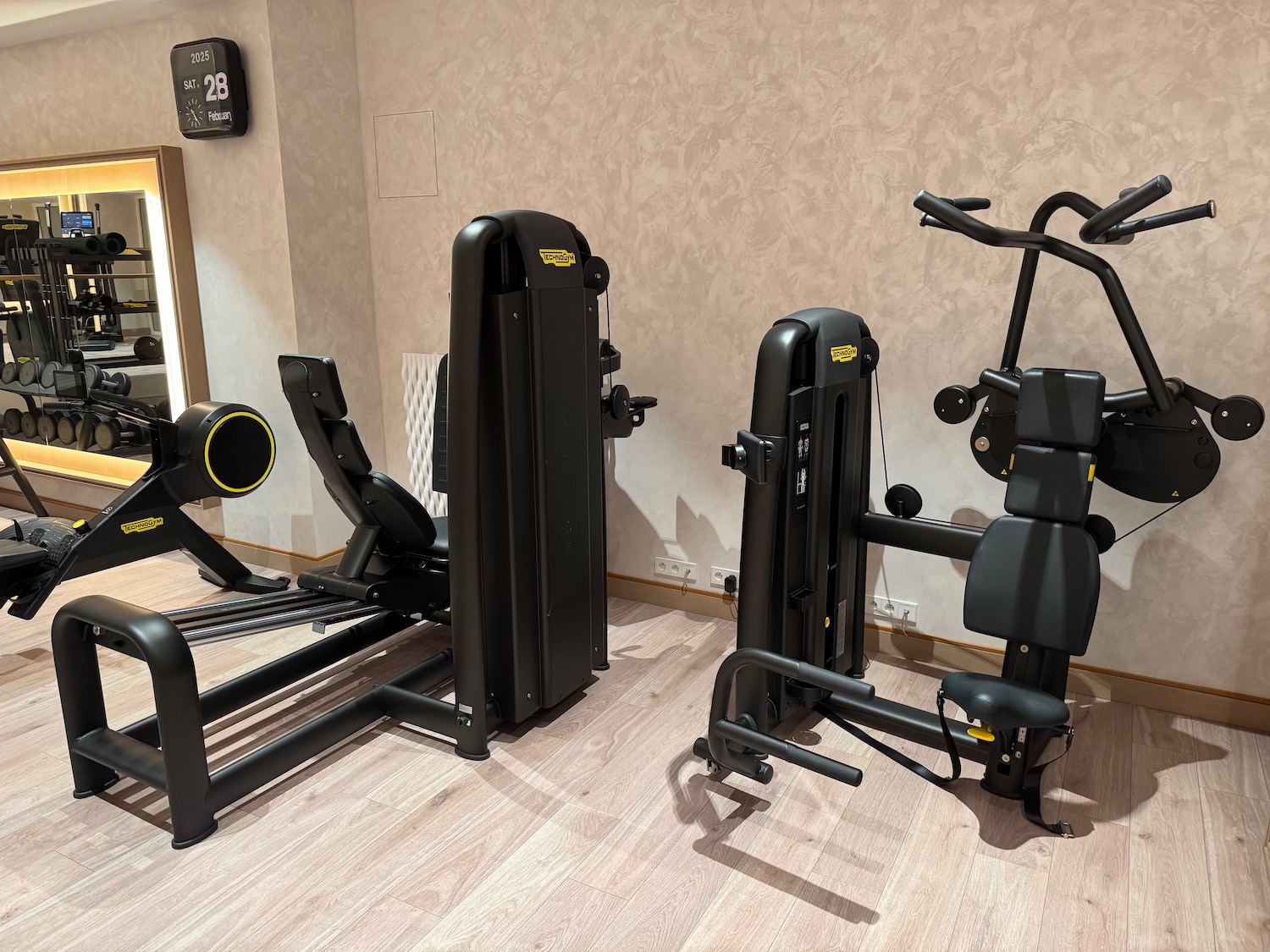 a group of exercise equipment in a room