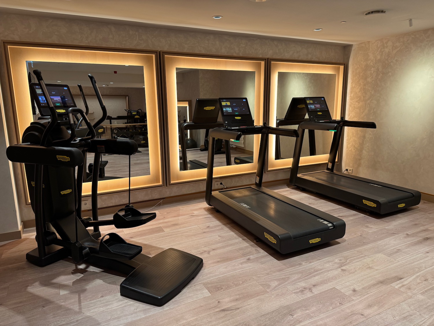 a group of treadmills in a room