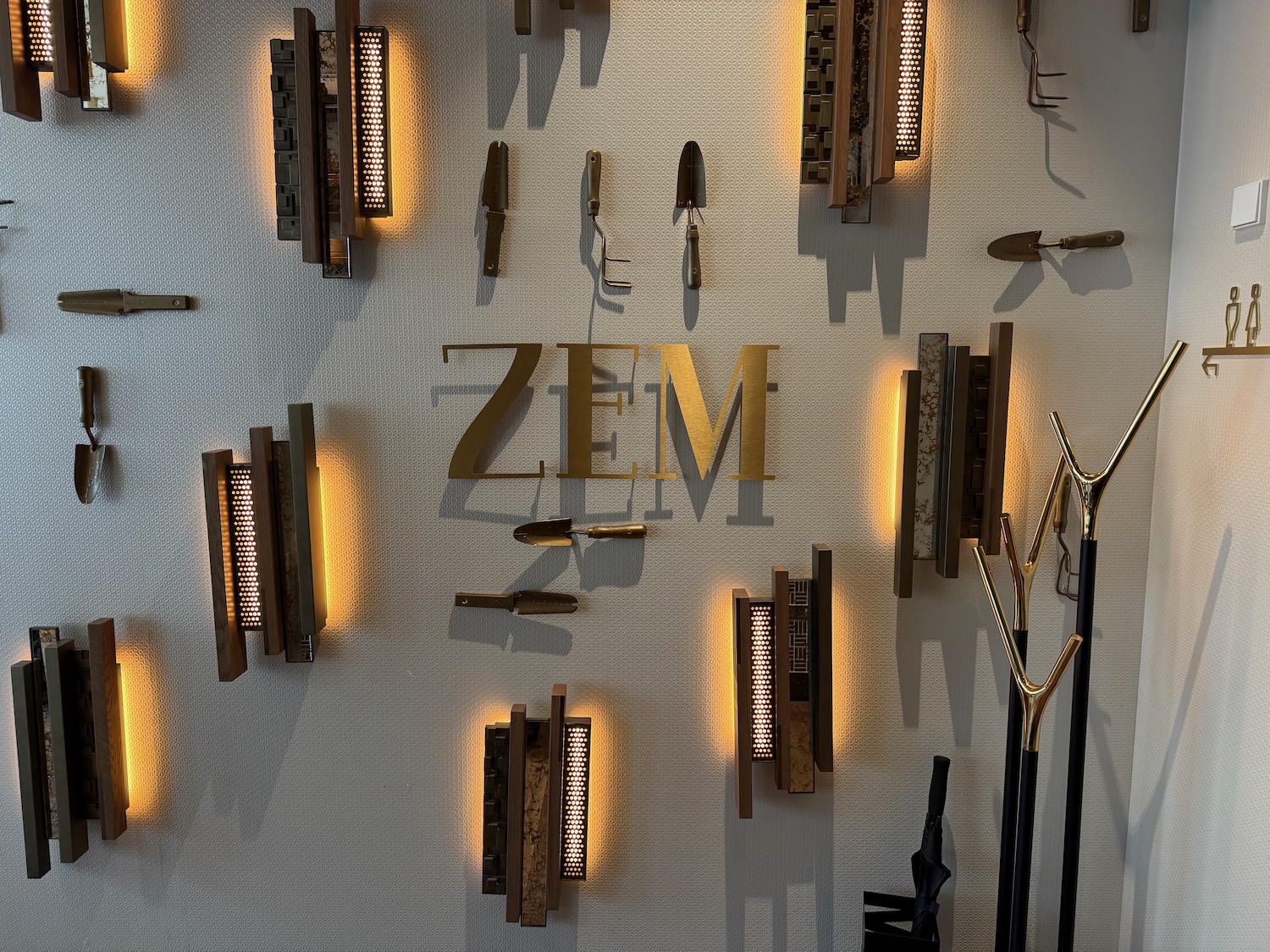 a wall with a sign and tools