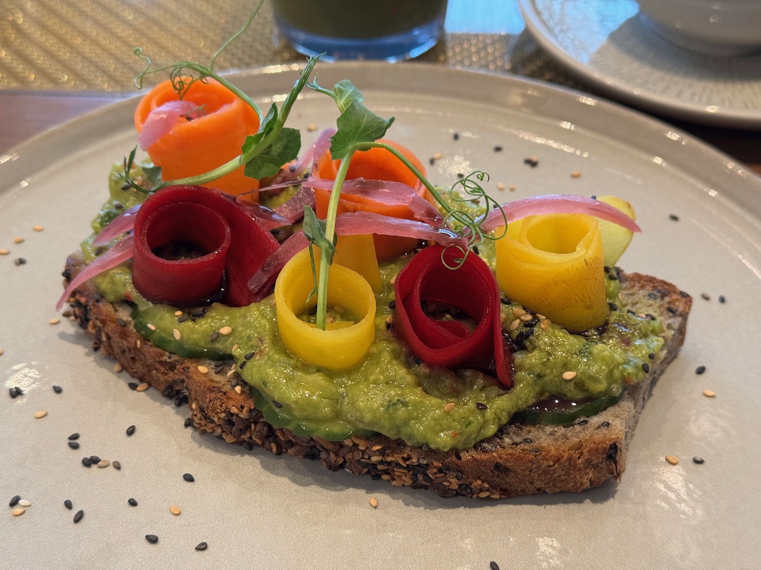 a plate of food with a flower on top