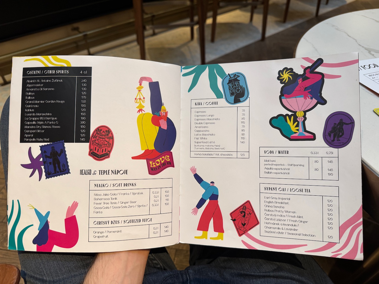 a person holding a menu