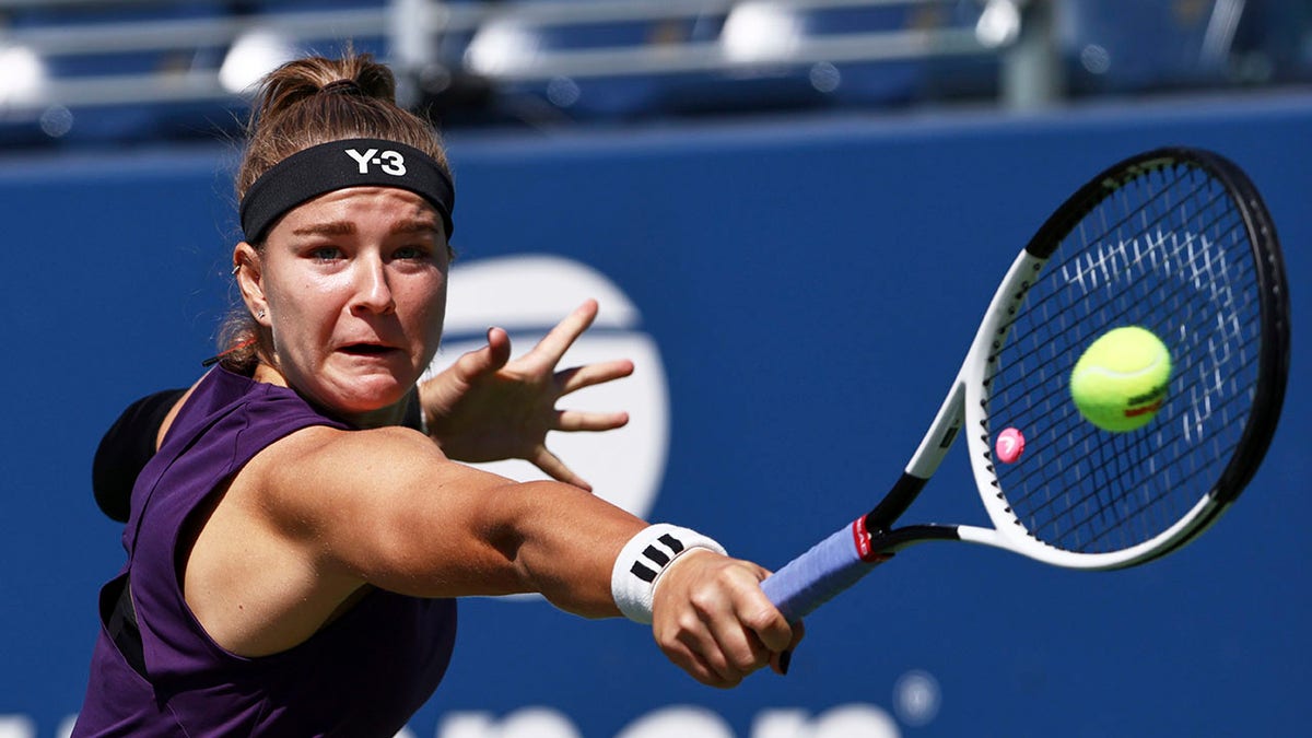 Karolina Muchova returns a shot