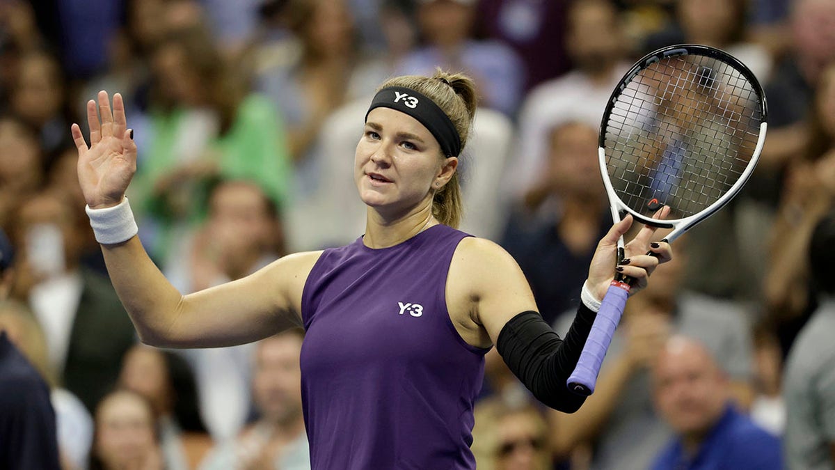 Karolina Muchova reacts to the crowd