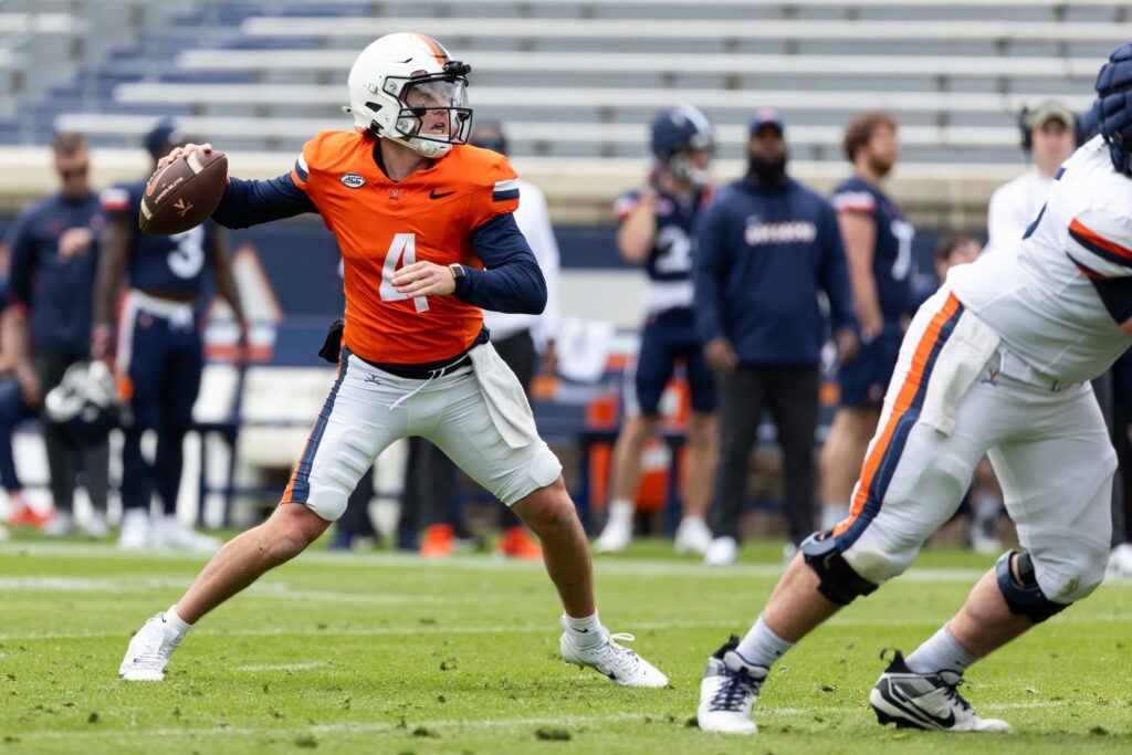 UVA quarterback Chandler Morris passing a football during a spring practice game 2024
