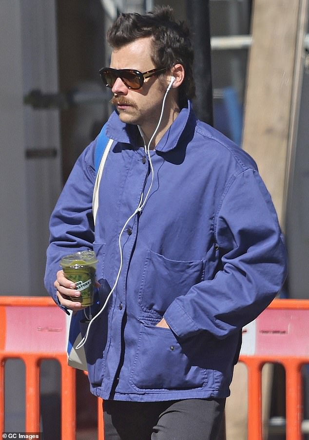 Harry Styles picking up an iced matcha tea in London’s Mayfair earlier this year