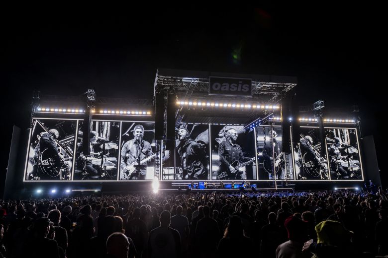 Oasis performs on August 24 at Rogers Stadium in Toronto. (Photo by Arthur Mola/Invision/AP)