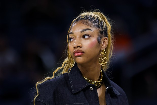 Sky forward Angel Reese stands on the court before a game against the Dream on July 16, 2025, at Wintrust Arena. (Eileen T. Meslar/Chicago Tribune)