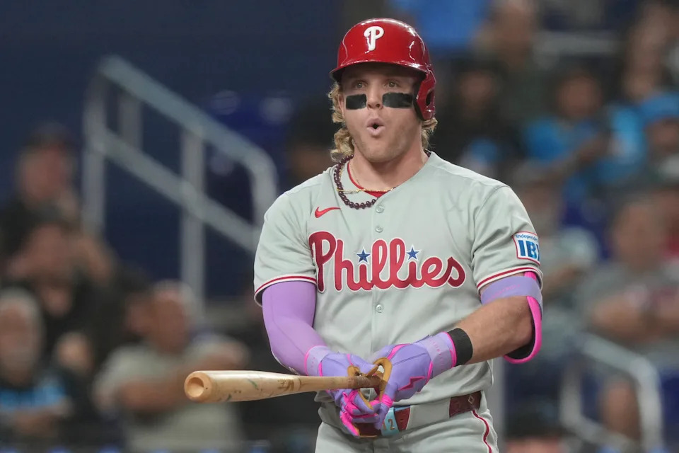 Harrison Bader holds a bat.