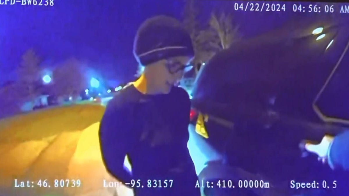 Minnesota State Senator Nicole Mitchell being arrested.