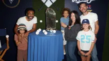 LOS ANGELES, CA - OCTOBER 28:  Donald Glover poses for a photo with his family prior to Game Four of the 2025 World Series presented by Capital One between the Toronto Blue Jays and the Los Angeles Dodgers at Dodger Stadium on Tuesday, October 28, 2025 in Los Angeles, California. (Photo by Joe Scarnici/MLB Photos via Getty Images)