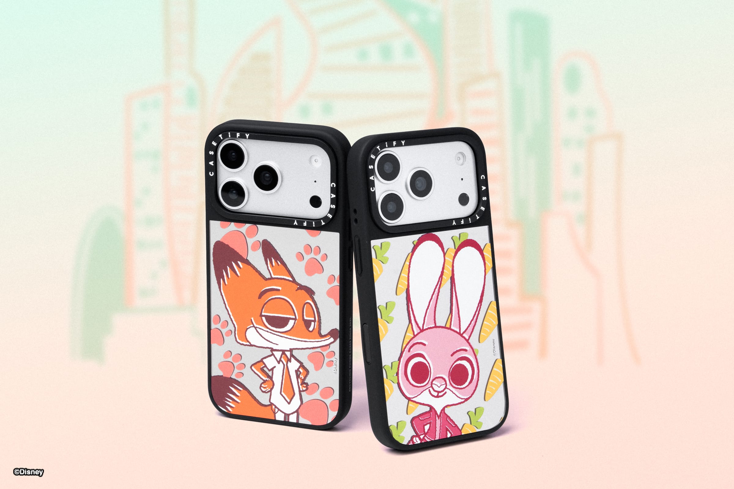 Two Zootopia 2-inspired phone cases: a fox in a tie and a smiling bunny with a bow tie, like Disney park merchandise.