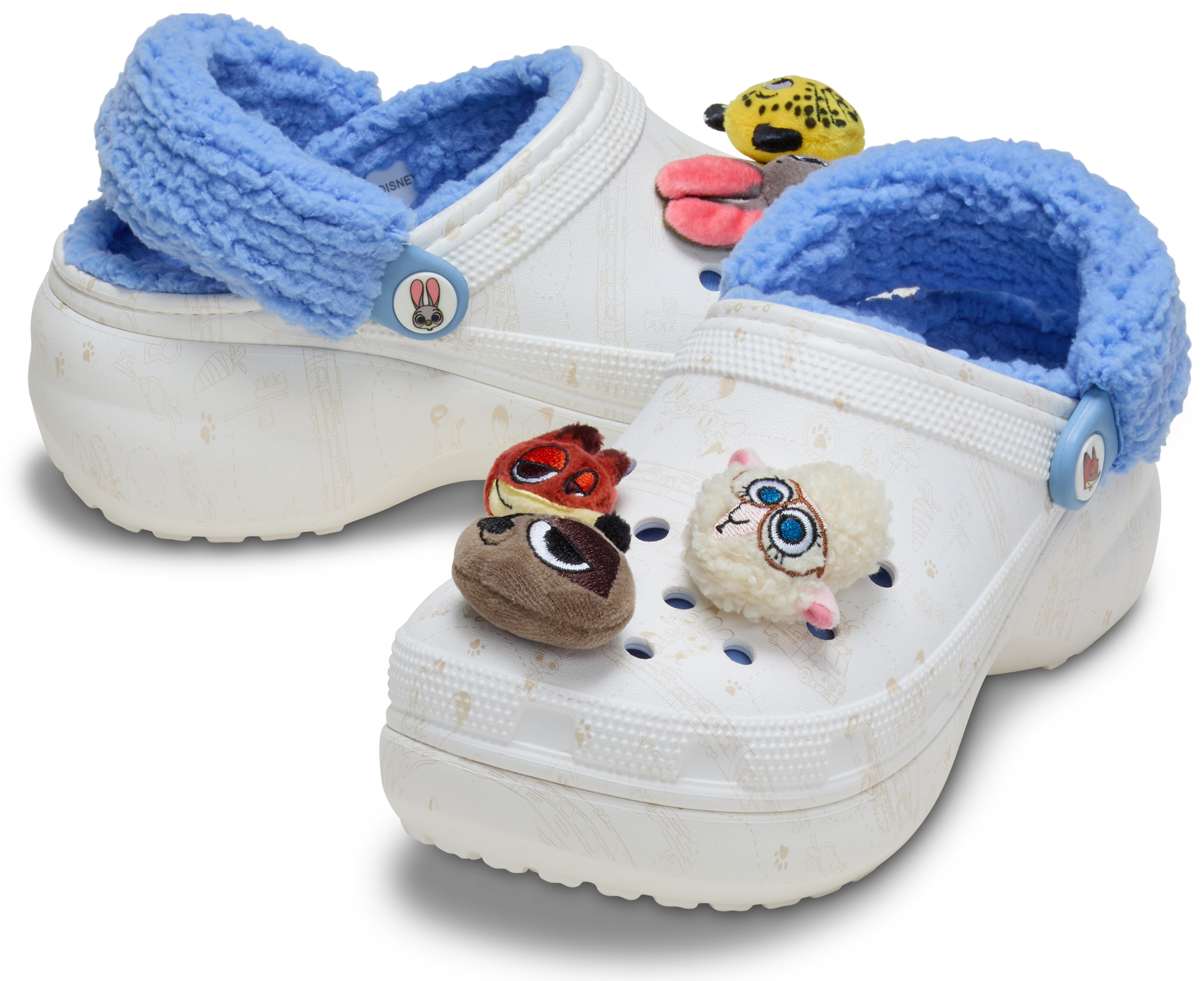 Exclusive Disney Parks clogs feature blue fuzzy lining and Zootopia 2 charms—unique to Disney Store, not seen at any park castle.