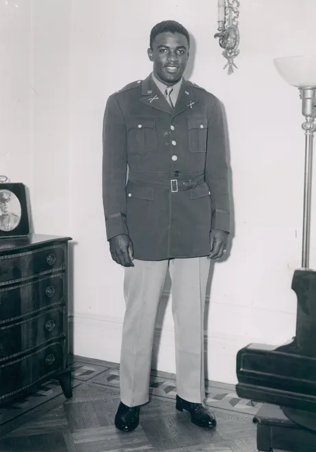 After being drafted in 1942, Jackie Robinson fought to enter Officers Candidate School while station in Kansas. While he didn't fight overseas, Robinson fought against racism, he was acquitted in a military court-martial for refusing to move to the back of a bus.