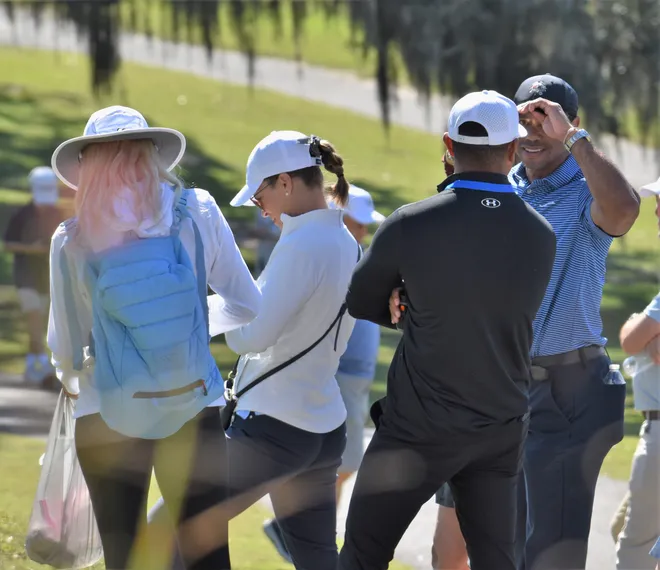 Tiger Woods and fellow Benjamin friends and family chat in the gallery and watch the Buccaneers play in the Class 1A state championship on Nov. 15, 2025.