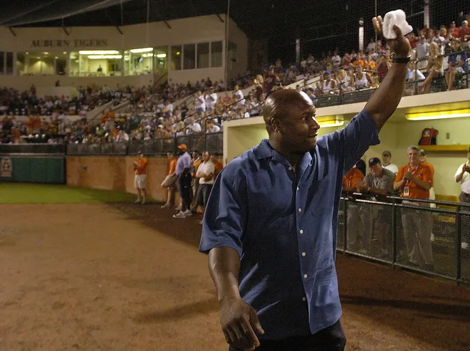 Bo Jackson waves to the crowd as he is introduced at the opening ceremony of the Dixie Youth World Series at Auburn University on Sunday August 7, 2005. (Montgomery Advertiser, Mickey Welsh)