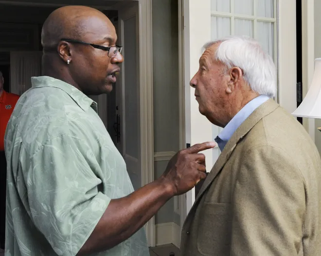 Bo Jackson chats with his former coach Pat Dye at the Wynlakes Country Club in Montgomery, Ala. on Sunday August 26, 2012. The two are in town for the First Tee of Montgomery Invitational golf tournament. (Montgomery Advertiser, Mickey Welsh)