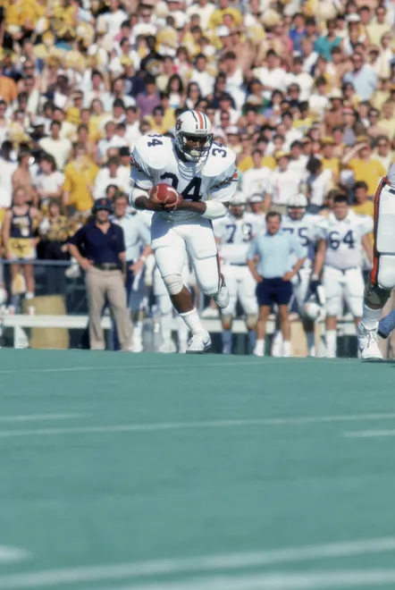 1985: Bo Jackson #34 of Auburn University carries the ball during a game in the 1985 season. ( Photo by: Scott Cunningham/Getty Images)