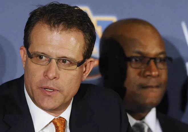 Gus Malzahn speaks as Bo Jackson looks on at a news conference at the Auburn University Athletic Complex in Auburn, Ala. on Tuesday December 4, 2012.(Montgomery Advertiser, Mickey Welsh)