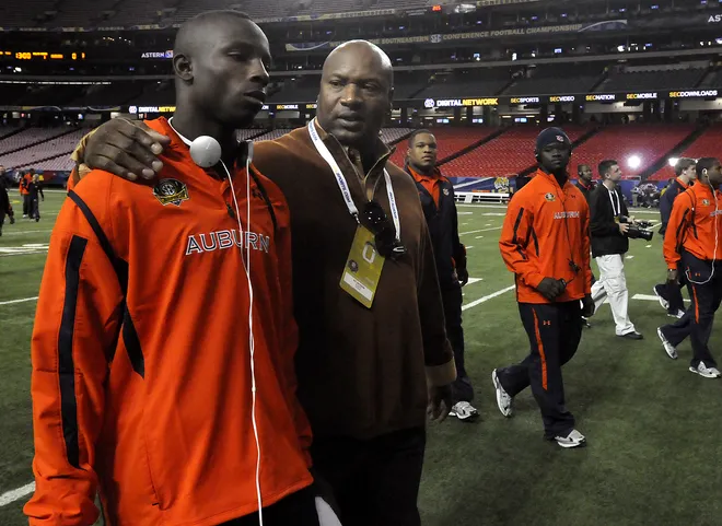 Former Auburn running back Bo Jackson, right, counsels current Auburn running back Onterio McCalebb before Auburn and South Carolina play in the SEC Championship game at the Georgia Dome in Atlanta, Dec. 4, 2010. (Montgomery Advertiser, David Bundy)