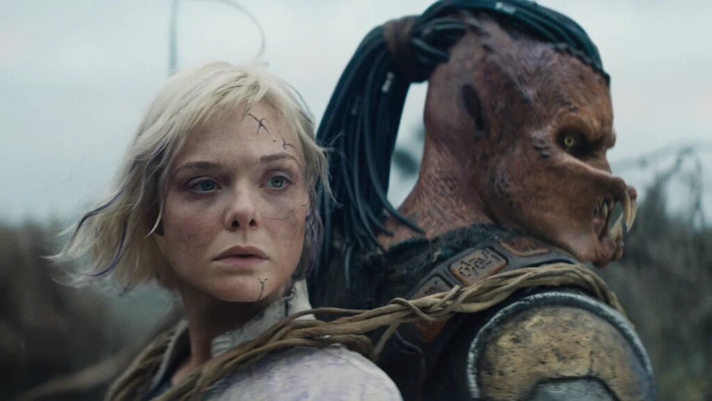 (L-R) Thia (Elle Fanning) and Dek (Dimitrius Schuster-Koloamatangi) in 20th Century Studios' Predator: Badlands