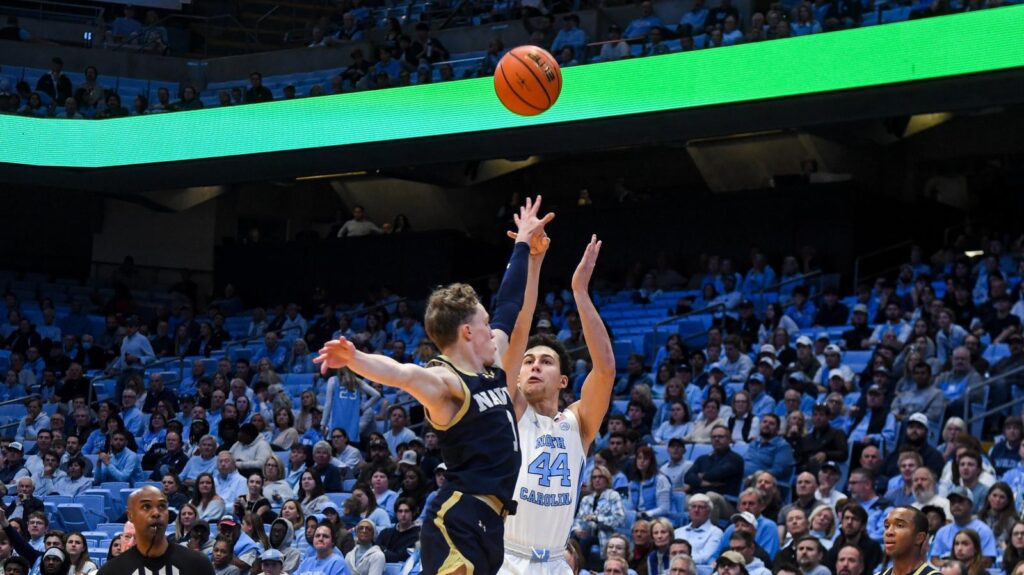 Maximo Adams recruiting photo shoe wall