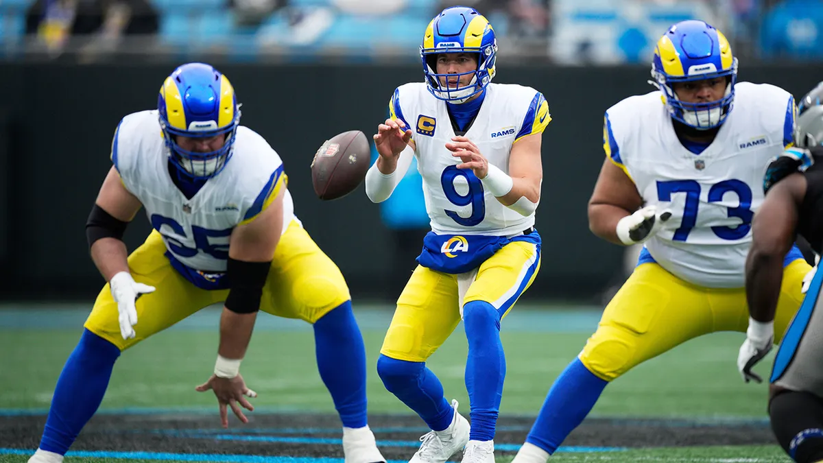 Matthew Stafford takes the snap