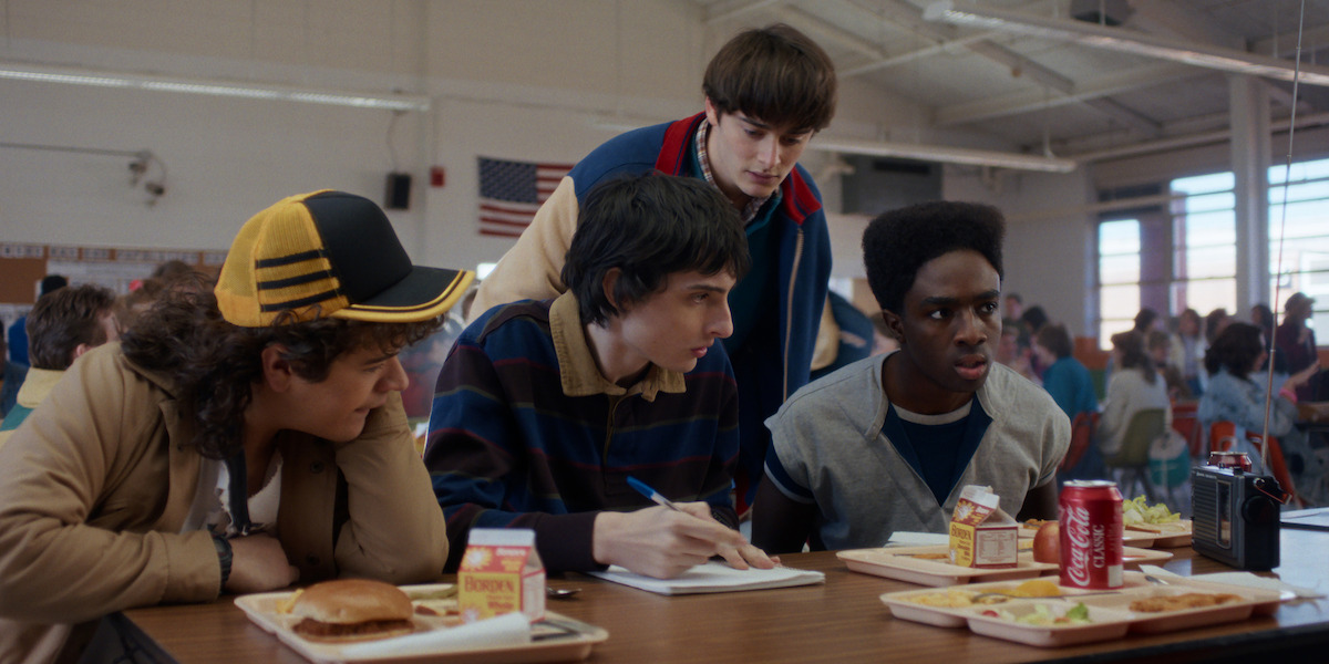 Gaten Matarazzo as Dustin Henderson, Finn Wolfhard as Mike Wheeler, Noah Schnapp as Will Byers, and Caleb McLaughlin as Lucas Sinclair in 'Stranger Things' Season 5