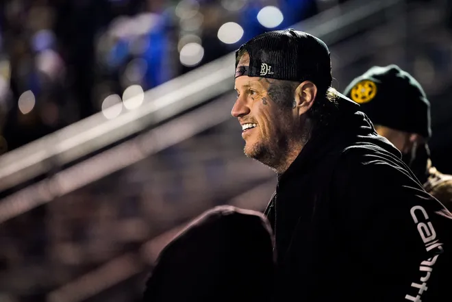 Jelly Roll watches the second quarter of a Class 5A semifinal game between Page and Centennial at Page High School in Franklin, Tenn., Friday, Nov. 28, 2025.