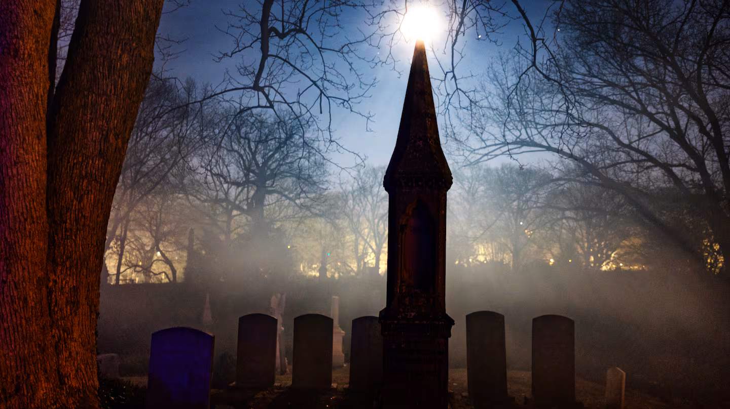 A full moon and some manufactured fog give an eerie feel to the Mount Auburn Cemetery in Cambridge during the “Solstice: Reflections on Winter Light” event in 2024.