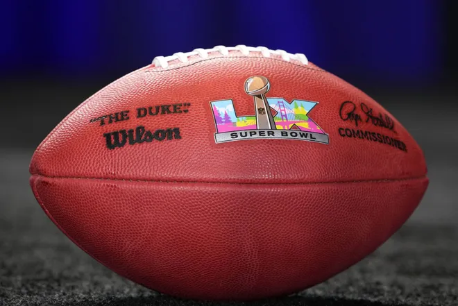 An official football with the Super Bowl XL (60) logo at the Super Bowl LIX host committee handoff press conference.