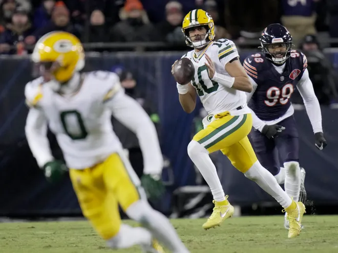 Green Bay Packers quarterback Jordan Love looks to throw a pass to wide receiver Matthew Golden against the Chicago Bears.