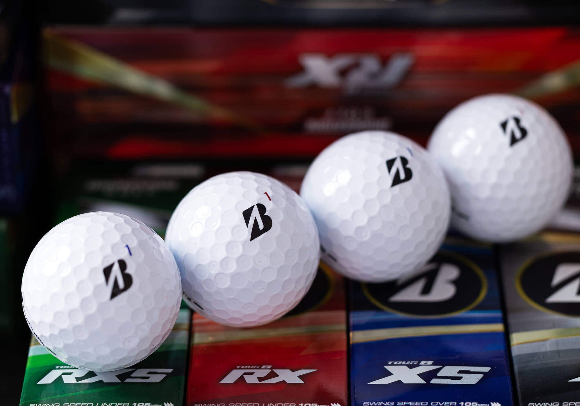 Bridgestone TOUR B series golf balls.
