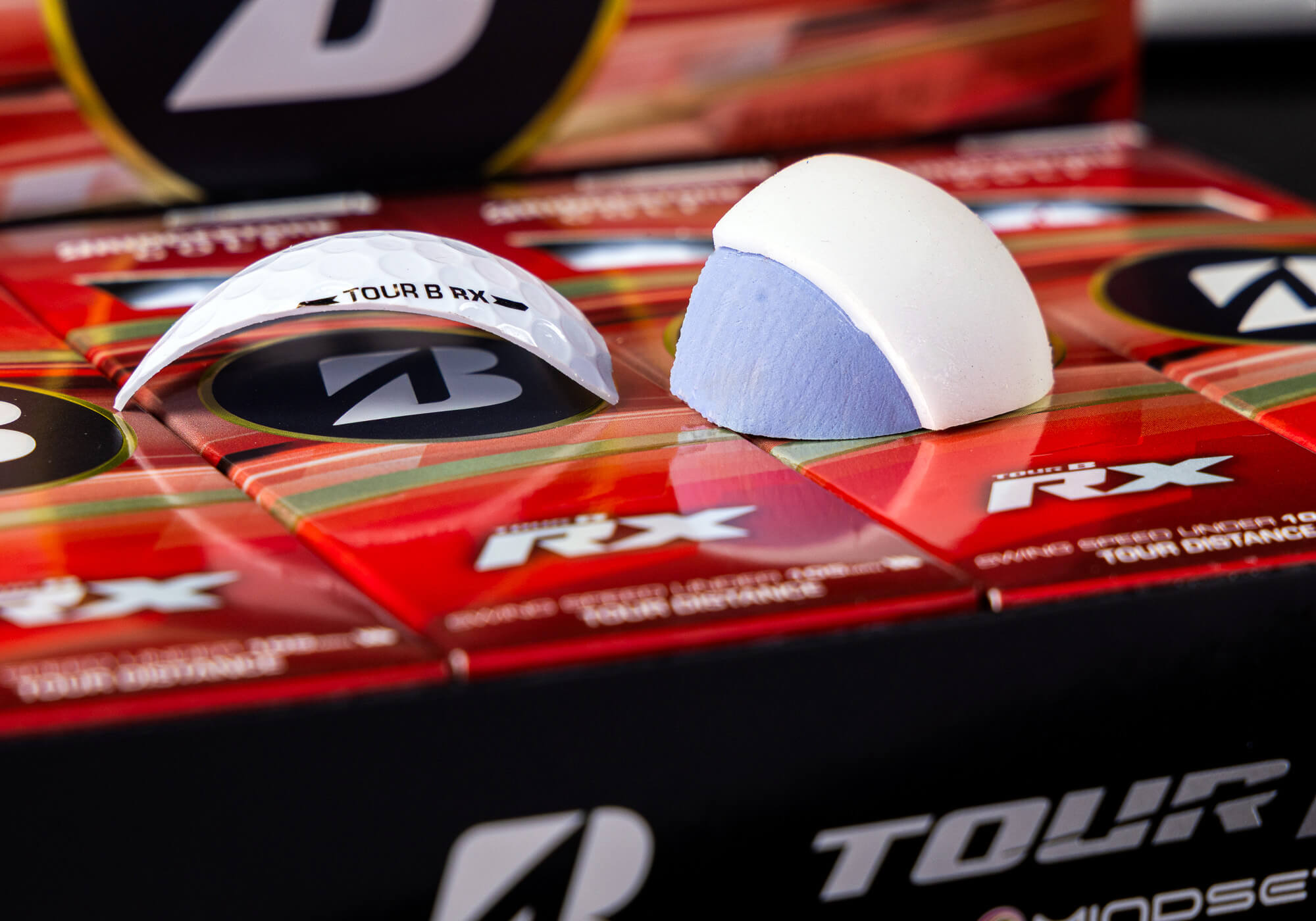 A photo representing the VeloCore intergration between the core and mangle of Bridgestone Tour B golf balls.