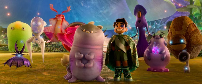 When 11-year-old Elio (voice of Yonas Kibreab, center right) is beamed up to space, he makes his first real friend, Glordon (Remy Edgerly), and meets all sorts of other aliens in the Pixar sci-fi comedy