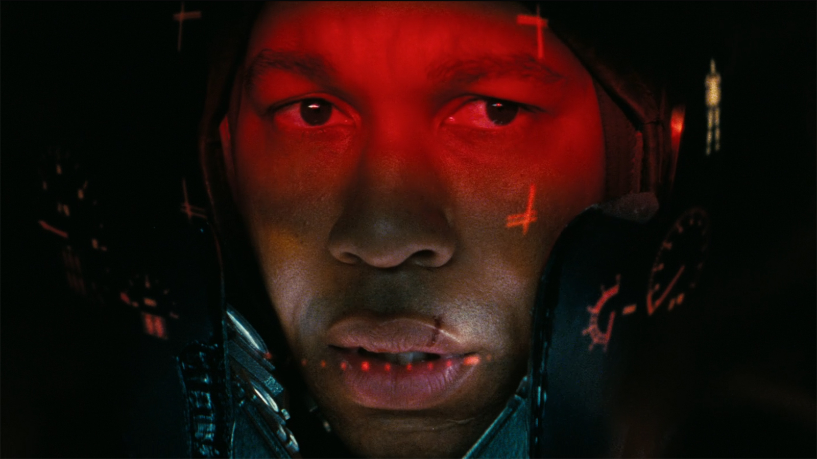 A shot of Maximus' face inside a Power Armor suit helmet with its HUD showing in Fallout season 2 episode 7