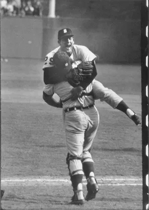 Detroit Tigers pitcher Mickey Lolich leaps into the grasp of catcher Bill Freehan after the final out in Game 7 in St. Louis, a 4-1 victory, to give them the 1968 World Series title over the Cardinals, Oct. 10, 1968. Lolich hurled three of the four Tigers victories over the Cardinals.