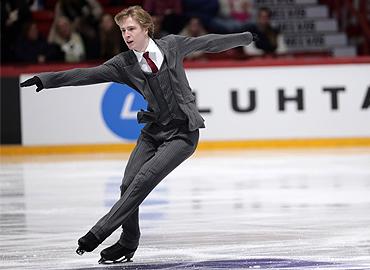 Stephen Gogolev skating on ice.
