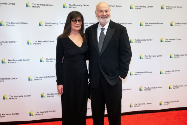 ADDITION ADDS MAIDEN NAME: FILE - Rob Reiner and Michele Singer Reiner arrive on the red carpet at the State Department for the Kennedy Center Honors gala dinner, Dec. 2, 2023, in Washington. (AP Photo/Kevin Wolf, File)