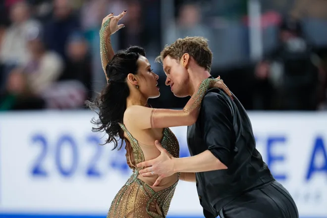Chock and Bates, who married in 2024 after years of on‑ice chemistry and a long courtship, first teamed up in 2011. Their partnership—professional and personal—has become one of figure skating’s defining stories. Take a look back at their love story on the ice from their early years as a team leading up to the 2026 Winter Olympics.