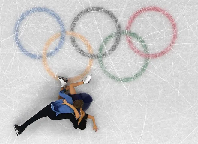 Madison Chock and Evan Bates (USA) fall as they perform in the figure skating free dance event during the Pyeongchang 2018 Olympic Winter Games at Gangneung Ice Arena.